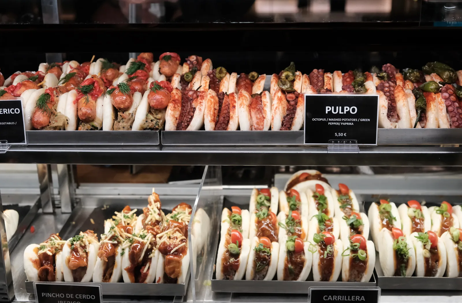 Rows of soft buns filled with octopus and other savory toppings